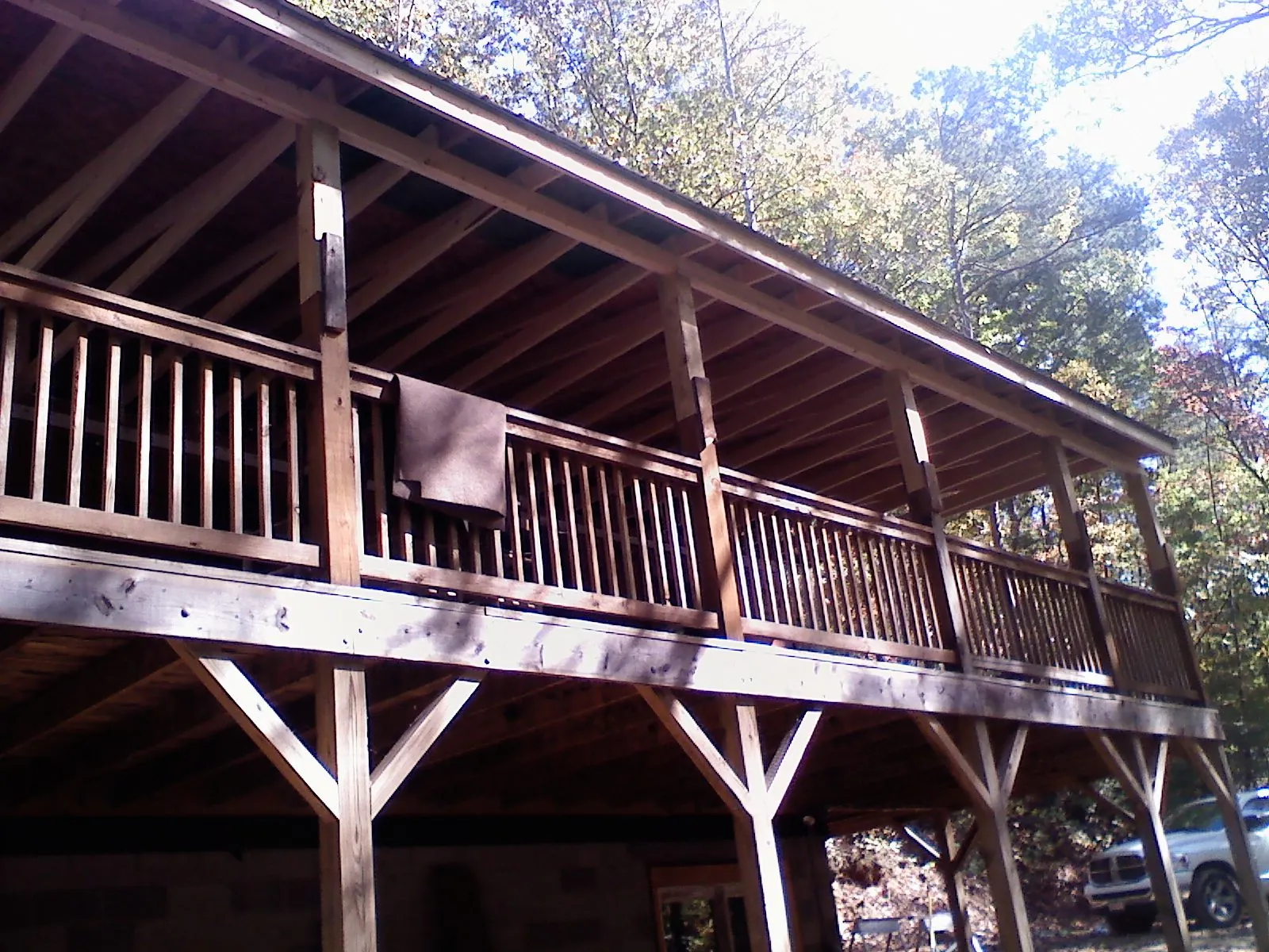 Timber framing under a new elevated porch and deck — Roof Leak Repair in Hubbard by Roofing Brothers